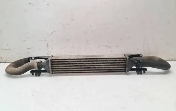 Opel Corsa D Intercooler radiator 440926702