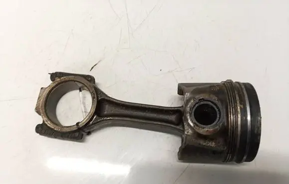 Volkswagen Touareg I Piston with connecting rod 038J
