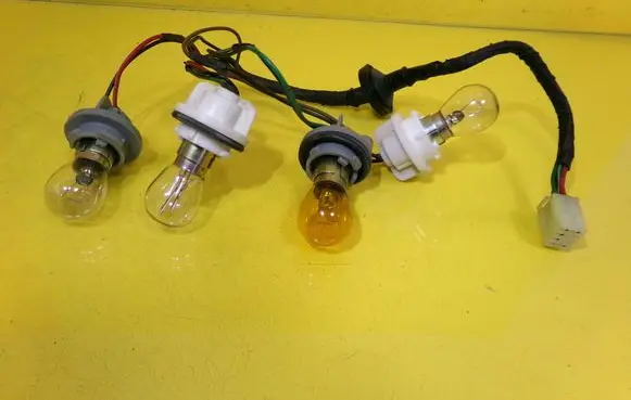KIA Shuma Tail light bulb cover holder