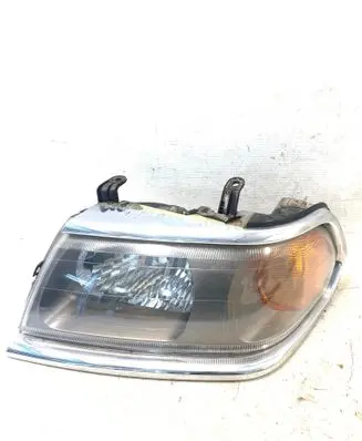 Mitsubishi Pajero Sport I Headlight/headlamp 10087415