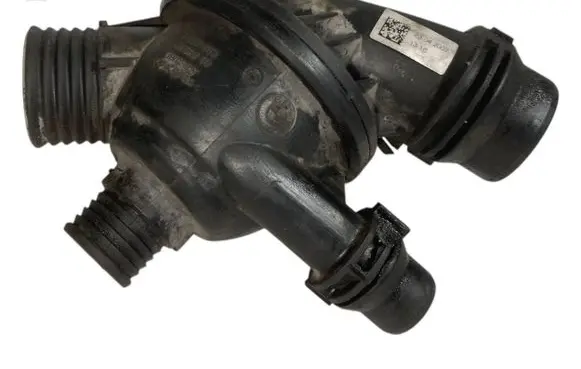 Thermostat/thermostat housing