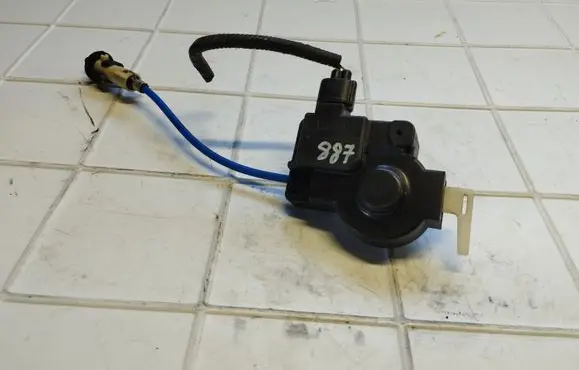 Fuel tank cap lock motor