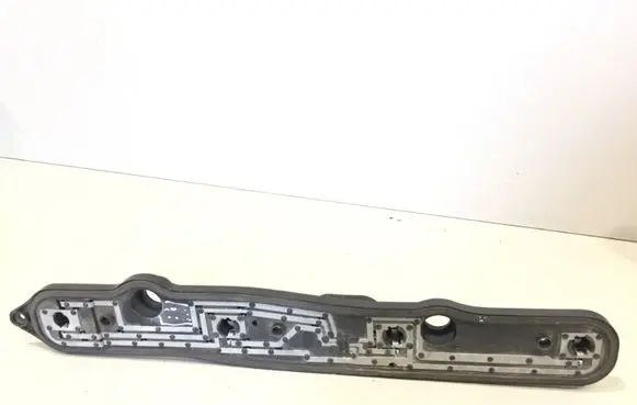 Tail light bulb cover holder