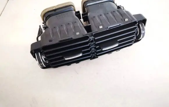 Jaguar XF Dash center air vent grill bj32104a22ad bj32-104a22-ad