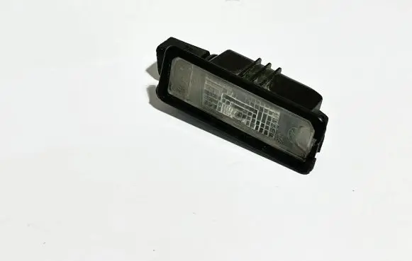Volkswagen Golf VII Number plate light 1K8943021 14654