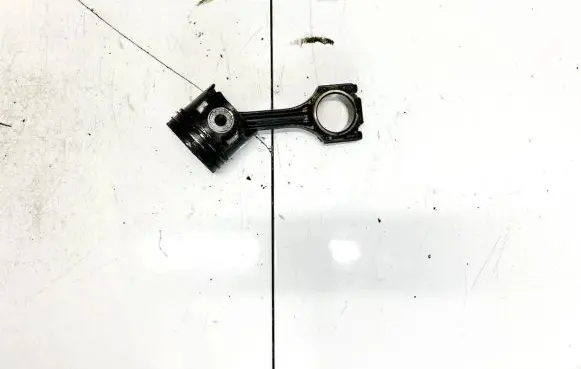 Piston with connecting rod