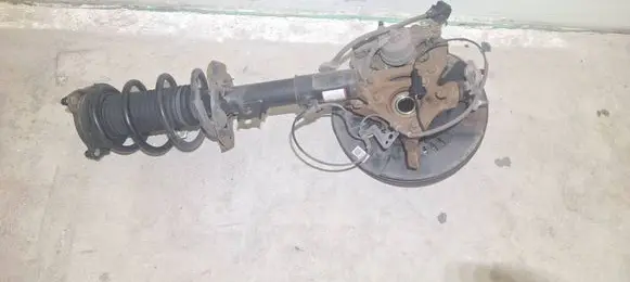 Front wheel hub spindle knuckle