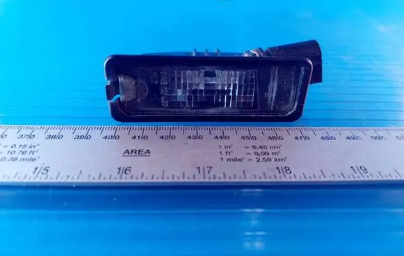 Volkswagen Golf VI Number plate light 1K8943021