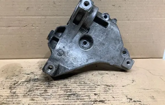 Volkswagen PASSAT B7 A/C compressor mount bracket 03C903143B