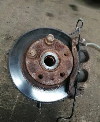 Front wheel hub spindle knuckle