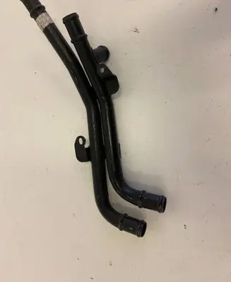 Volkswagen Touareg II Engine coolant pipe/hose 7P0121070AC