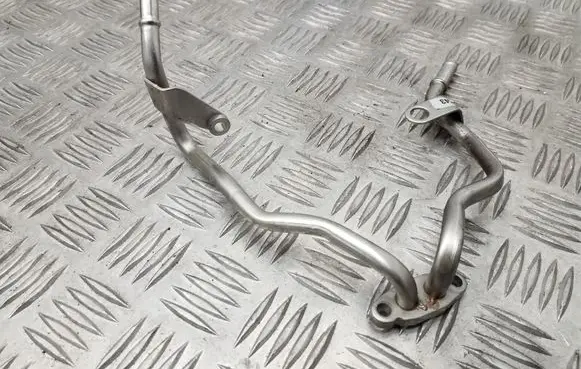 Volkswagen Golf VII Engine coolant pipe/hose 05E121497A