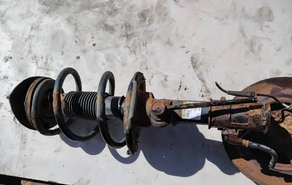 Hyundai H-1, Starex, Satellite Front shock absorber with coil spring 