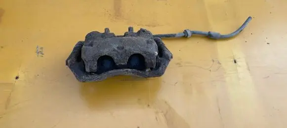 Nissan Primastar Front brake caliper 4101100QAF