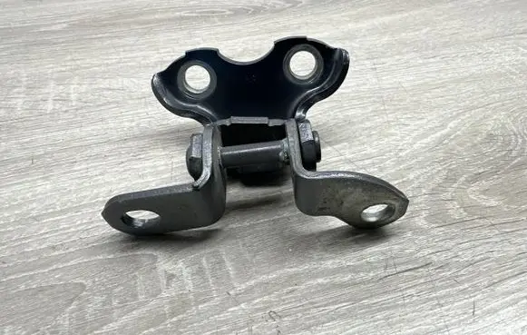 Rear door upper hinge