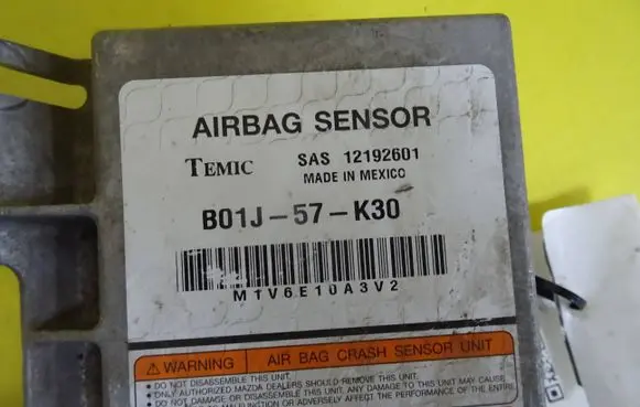 Mazda 323 F Airbag control unit/module B01J-57-K30 3321844