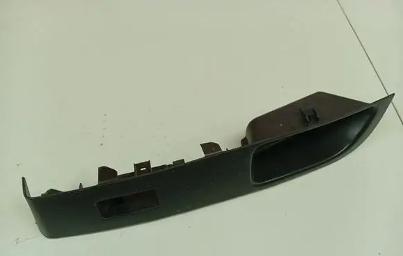 Nissan Micra Front door window switch trim