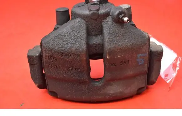 Volkswagen Golf V Front brake caliper