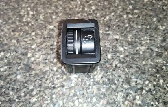 Panel lighting control switch