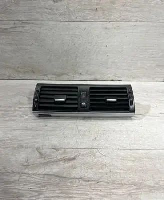 Dash center air vent grill