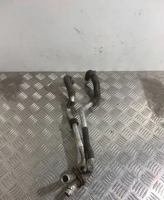 Volkswagen Touareg II Engine coolant pipe/hose 7P0819911D 7P0819857C
