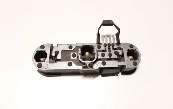 Tail light bulb cover holder