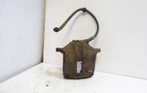 Peugeot Partner Front brake caliper 1617292080
