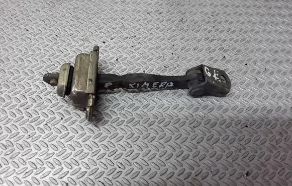 Nissan Primera Rear door check strap stopper