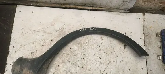 Renault Kangoo I Front arch trim 8200077573