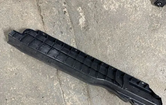 Radiator support slam panel