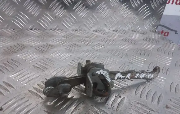 Front door check strap stopper