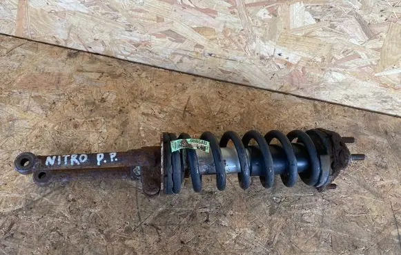 Dodge Nitro Front shock absorber with coil spring AMORTYZATORPPNITRO