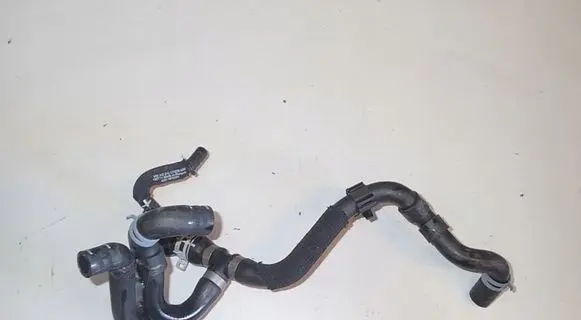 Volkswagen Golf VII Engine coolant pipe/hose 04L121030KA