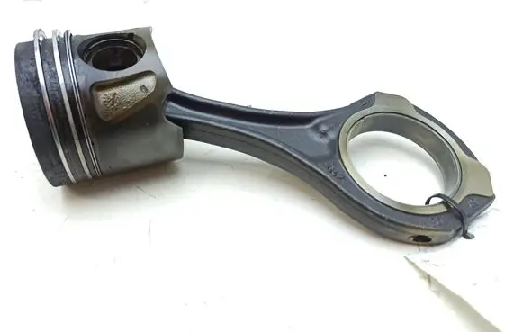 Piston with connecting rod