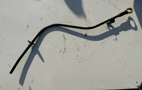 Oil level dip stick