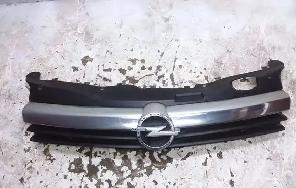 Opel Astra H Front bumper upper radiator grill 60008131
