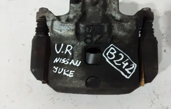 Nissan Juke I F15 Front brake caliper 7GH82