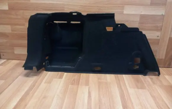 Trunk/boot lower side trim panel