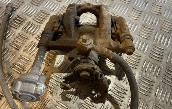 Opel Astra J Rear brake caliper