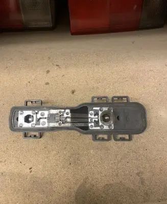 Nissan Primera Tail light bulb cover holder 89025242