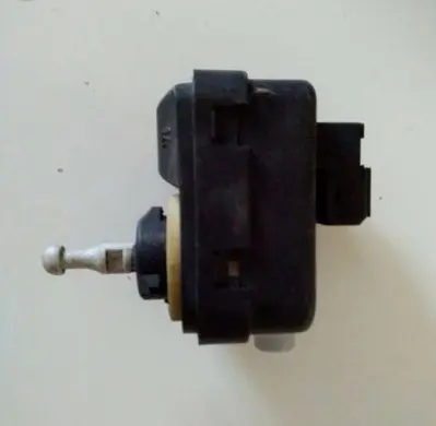 Nissan Note (E11) Headlight level adjustment motor 89028944