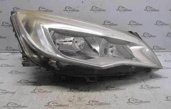Opel Astra J Headlight/headlamp 13253657 1LG010011