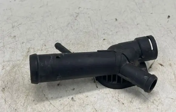 Volkswagen Golf VI Thermostat housing 03L121131F