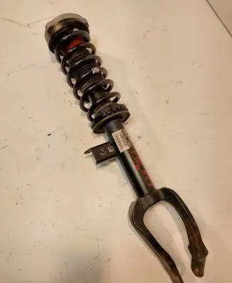 Front shock absorber with coil spring