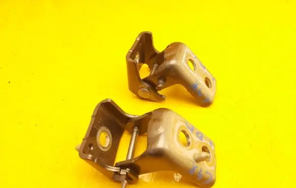 Front door lower hinge