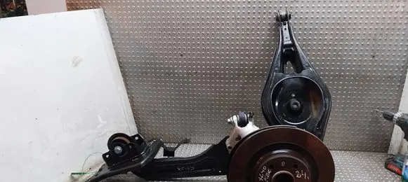 Rear wheel hub spindle/knuckle