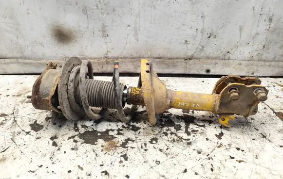 Subaru Legacy Front shock absorber with coil spring