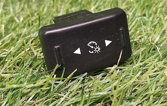 Panel lighting control switch