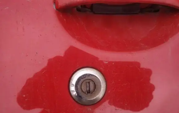 Peugeot 206 Front door lock (next to the handle) 