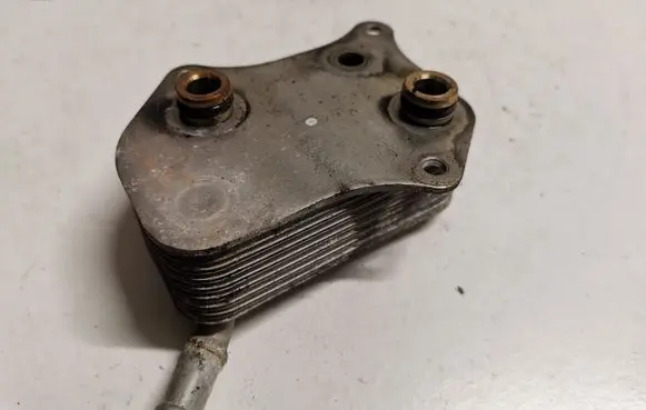 Audi A6 S6 C6 4F Engine oil radiator 06B117021